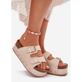 Infradito da donna con fibbie su una piattaforma enorme beige 1
