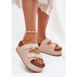 Infradito da donna con fibbie su una piattaforma enorme beige 2