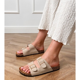 Le alette beige con morsetti su una suola di sughero 1