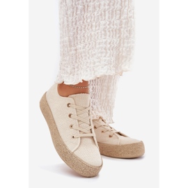 Sneaker femminili sulla piattaforma con beige intrecciata 1