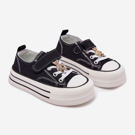 Girls 'Sneaker con una spilla dorata nero 1