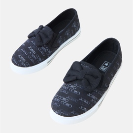 Sneaker per bambini neri con un arco nero 1