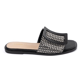 Goodin Tedeed Flaps su una suola piatta in bianco e nero 1