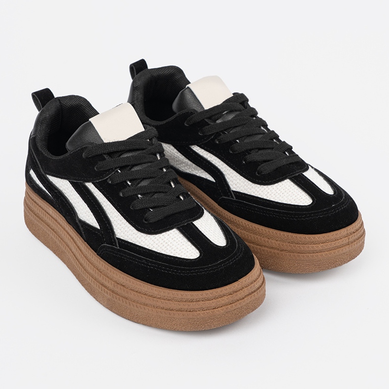 Sneaker da donna nera con inserti bianchi. nero 2