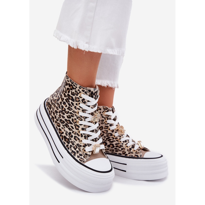 Sneaker alte femminili su una piattaforma enorme con leopardo leopardo d'oro 1