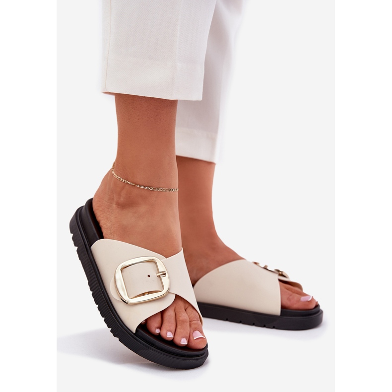 Le pantofole da donna sulla piattaforma con un beige di morsetto d'oro 1