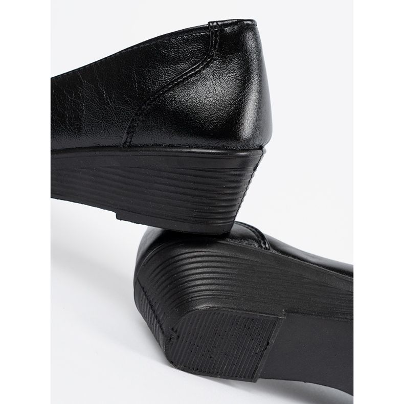 Scarpe scorrevoli nere con un arco nero 1