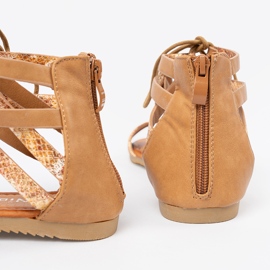 Shelvt Sanadals Lace -Up con un motivo di serpente 1