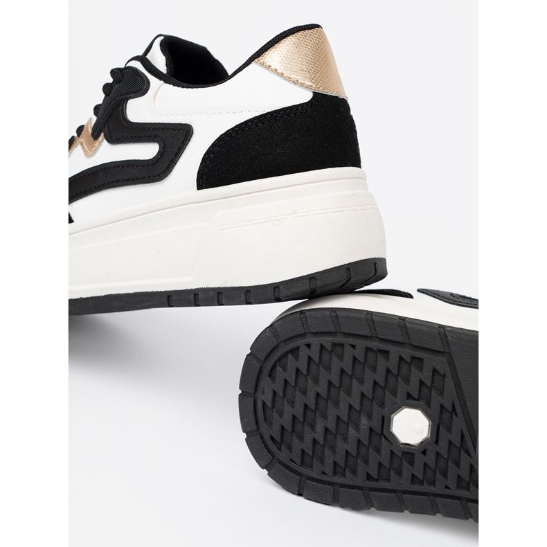 Shelvt Sneaker in bianco e nero con dettagli dorati 1