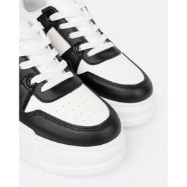Shelvt Eleganti sneaker in bianco e nero con una suola spessa 1
