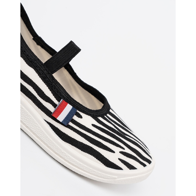 Shelvt Sneaker a luce in bianco e nero inserite con un motivo zebra 1