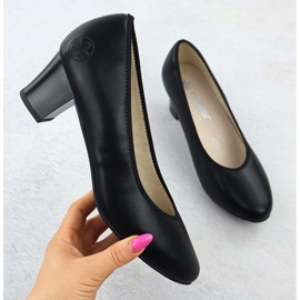 Pompe in pelle da donna su un pilastro basso rieker 44650 1