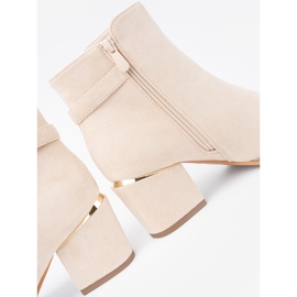 Shelvt Stivali beige leggeri sul palo con un morsetto decorativo 2