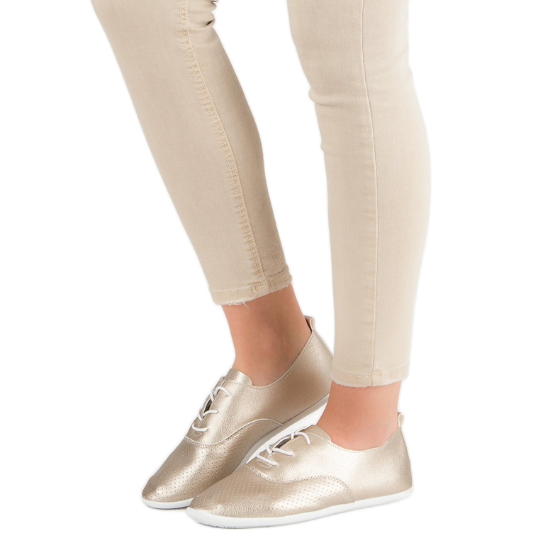 Sneakers annodate dorate d'oro 1