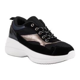 Calzature alla moda sulla piattaforma nero 1