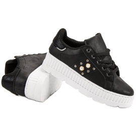 Scarpe nere sulla piattaforma nero 1