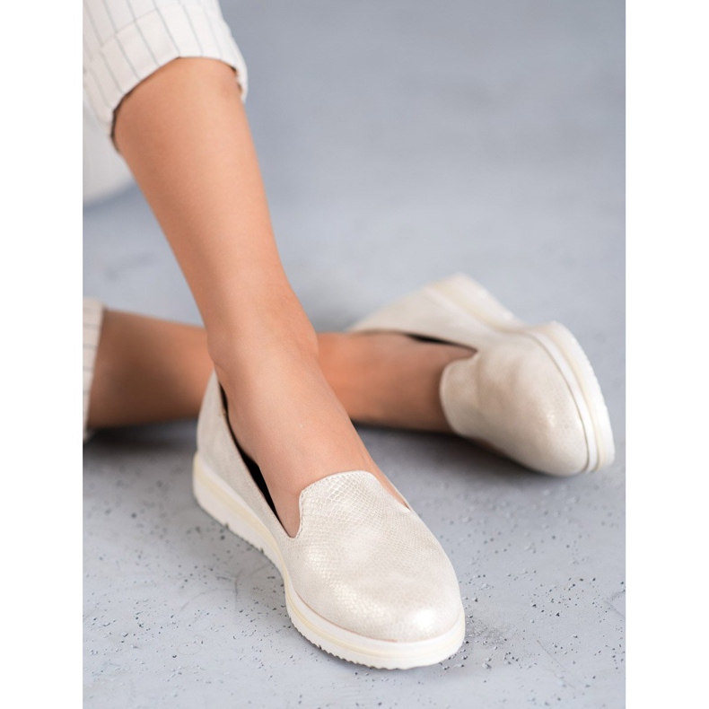 Kayla Signori beige 2