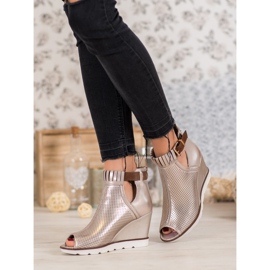 Filippo Stivaletti dorati d'oro 1