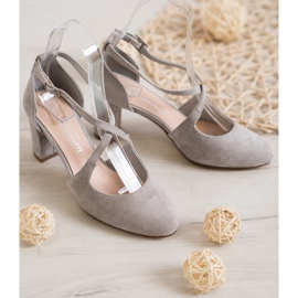 Sergio Leone Pompe alla moda su un pilastro grigio 2