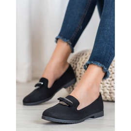 Miss Laura Signori con ornamento nero 2
