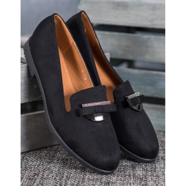 Miss Laura Signori con ornamento nero 1
