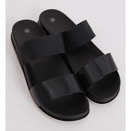 Nero CK66P Pantofole nere con cinturini in gomma 1