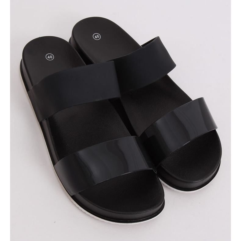 Nero CK66P Pantofole nere con cinturini in gomma 1