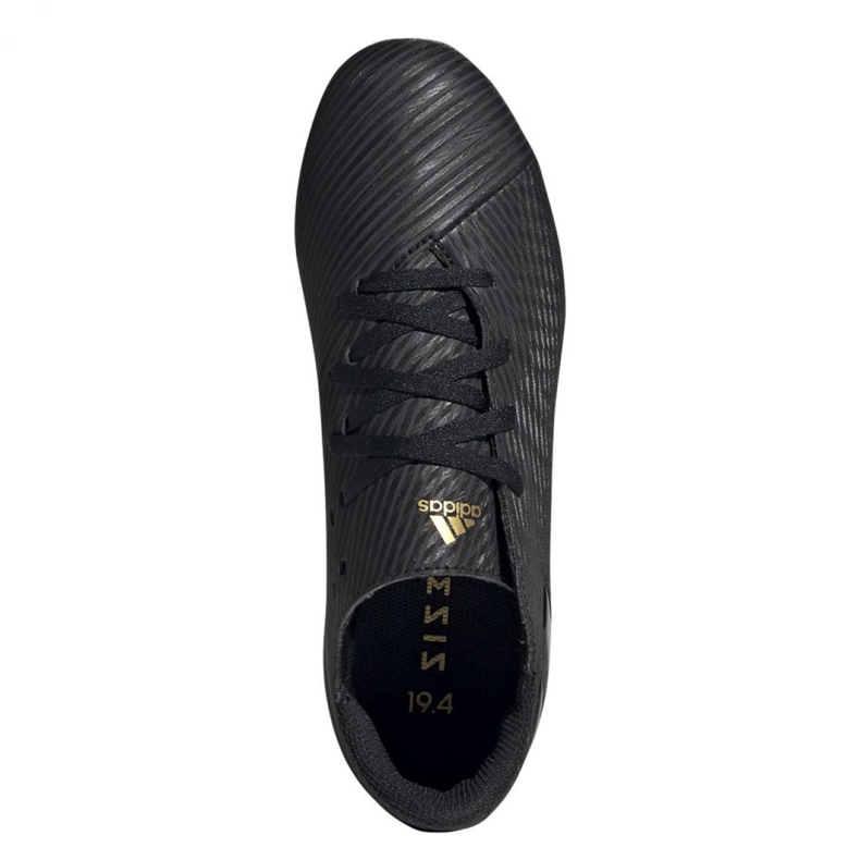 Le scarpe da calcio adidas Nemeziz 19.4 FxG Jr EG3175 multicolore nero 1