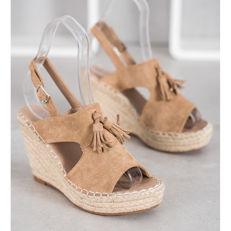 Small Swan Sandali costruiti con frange marrone 1