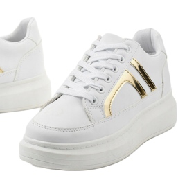 Le prime sneakers bianche bianca d'oro 1