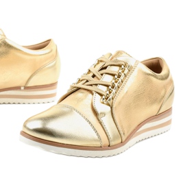 Sneakers con zeppa dorate 15S8621 d'oro 1