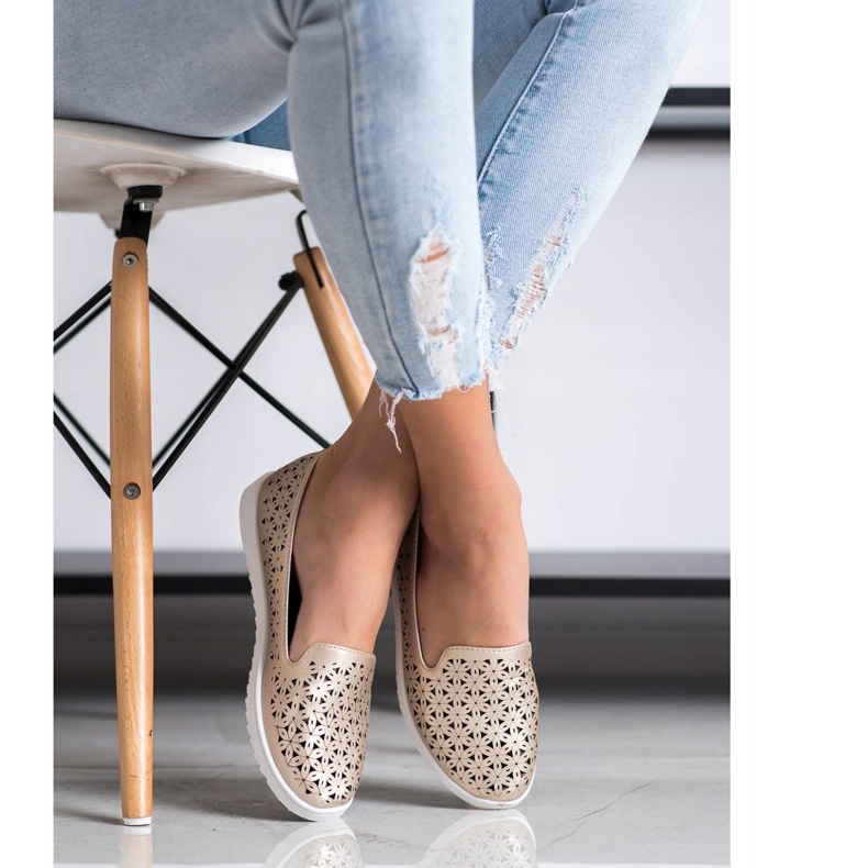 Renda Comodi signori traforati d'oro 1