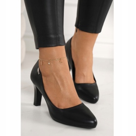 PJ1 Décolleté classiche nere Eleanor su un bar nero 3