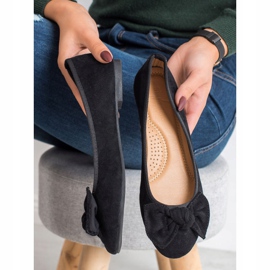 Sixth Sense Ballerina con un fiocco nero 1