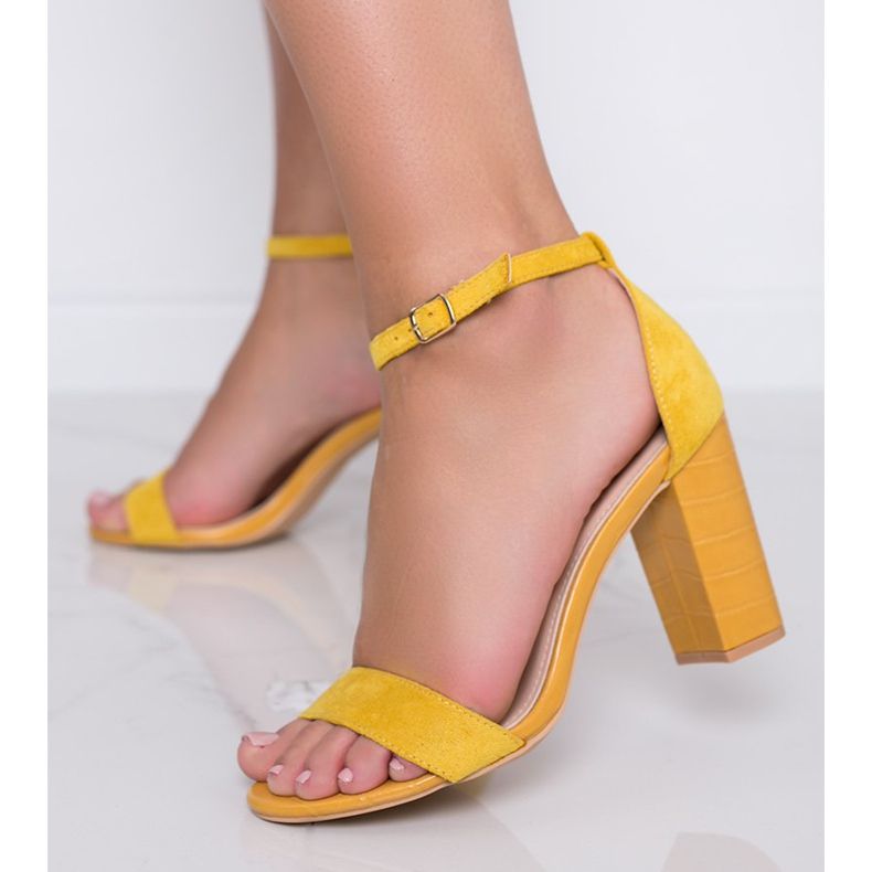 Décolleté gialle su un palo con motivo a pelle di serpente Dolores giallo 1