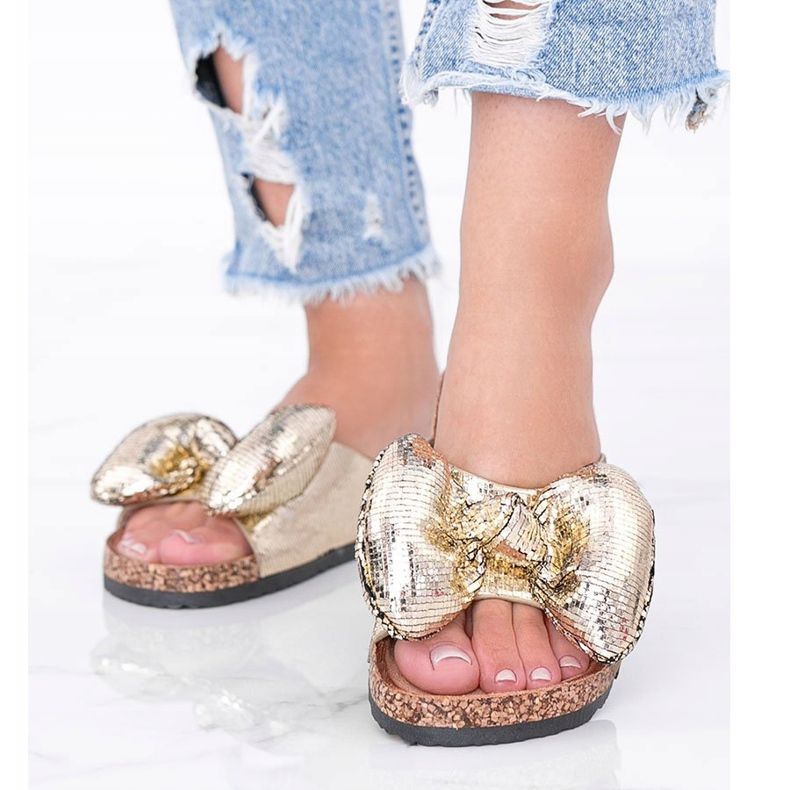 Pantofole dorate con fiocco Norris d'oro 1