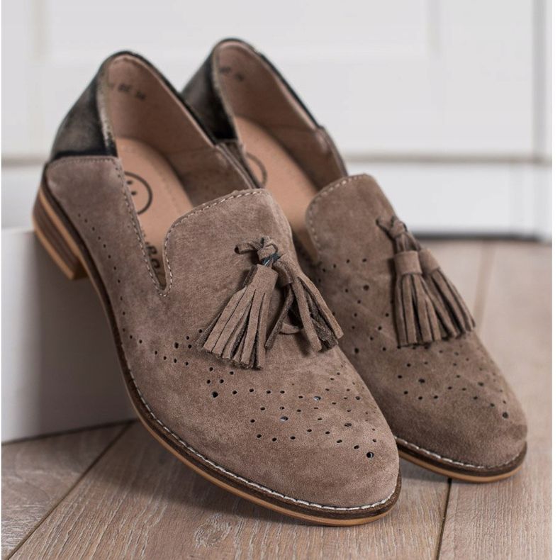 Filippo Signori in pelle con frange marrone 2