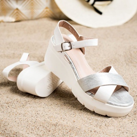 Small Swan Sandali con zeppa bianca d'argento 1