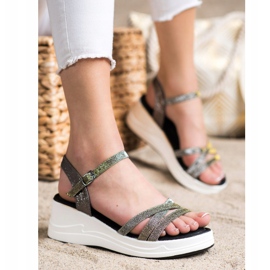 Small Swan Sandali con glitter sulla zeppa nero 1