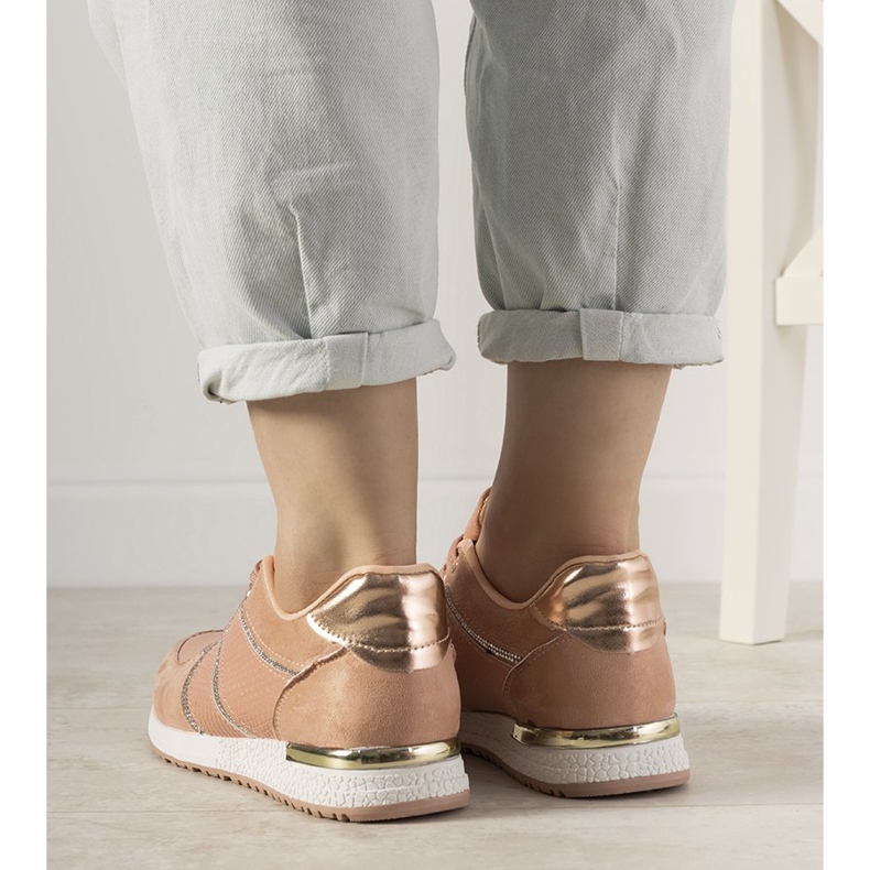 Sneakers Ecoma rosa con motivo a pelle di serpente 1