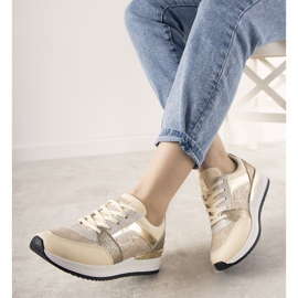 Sneakers beige con motivo a pelle di serpente di Frances d'oro 1