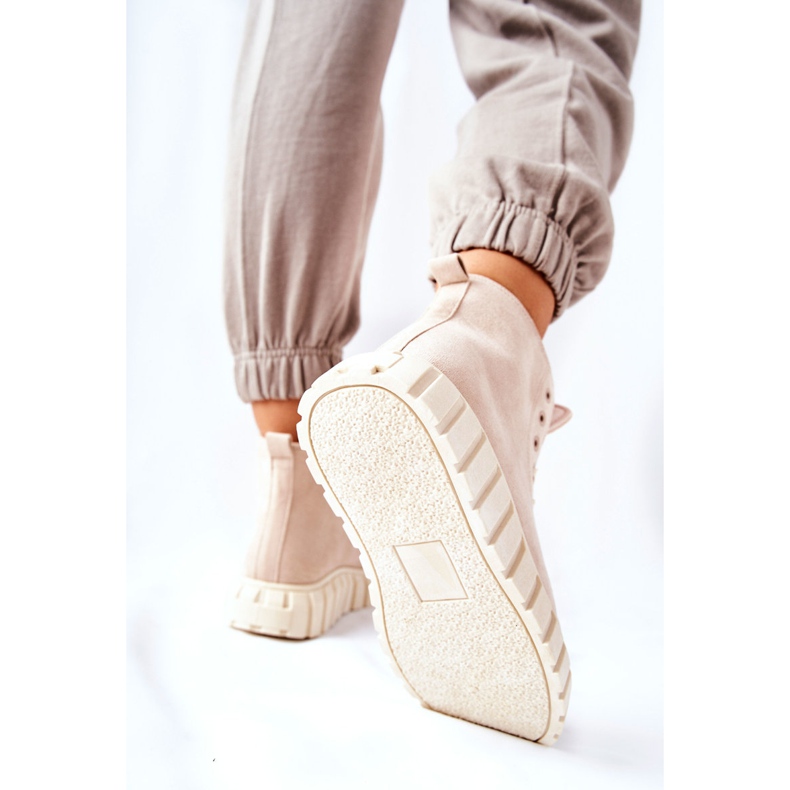 Sneakers alte in pelle scamosciata su una piattaforma Meniphise beige 1