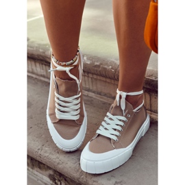 Sneakers da donna sulla piattaforma marrone arriva 1