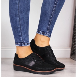 Scarpa da donna in pelle su zeppa nera e marrone Filippo nero 1