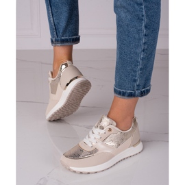 Sneakers beige da donna Shelovet con motivo serpente 1