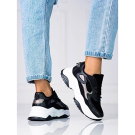 Sneakers da donna con lacci Shelovet su plateau alto in bianco e nero 1