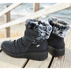 Stivali invernali da donna impermeabili Rieker Y1361-00 neri bianco 1