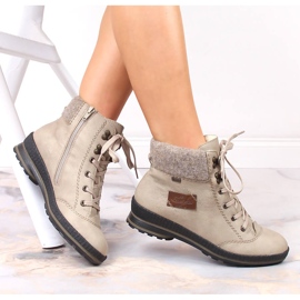 Stivali isolanti beige da donna impermeabili e confortevoli Rieker Z2430-60 1