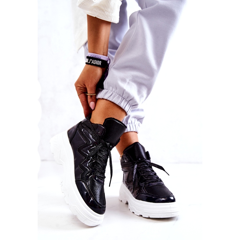 Scarpe sportive isolate da donna nero 1