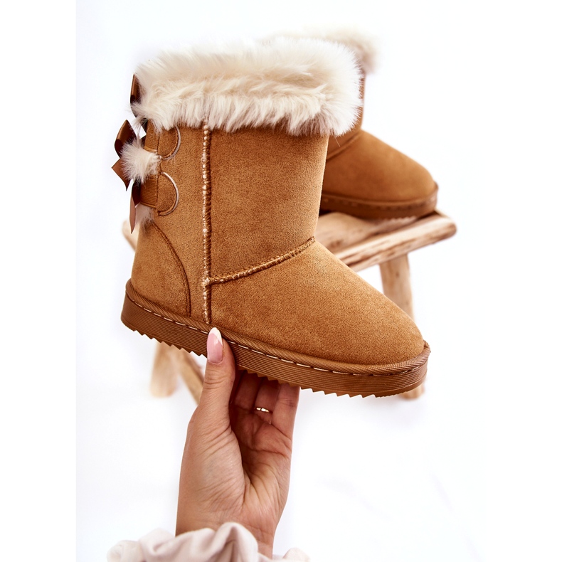 Stivali isolati per bambini con fiocchi, stivali da neve beige 1